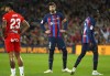 Barcelona's Gerard Pique, centre, during a Spanish La Liga soccer match between Barcelona and Almeria at the Camp Nou stadium in Barcelona, Spain, Saturday, Nov. 5, 2022. (AP Photo/Joan Monfort)