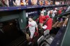 The Philadelphia Phillies watch the Houston Astros celebrate their 4-1 World Series win against the Philadelphia Phillies in Game 6 on Saturday, Nov. 5, 2022, in Houston. (AP Photo/Tony Gutierrez)