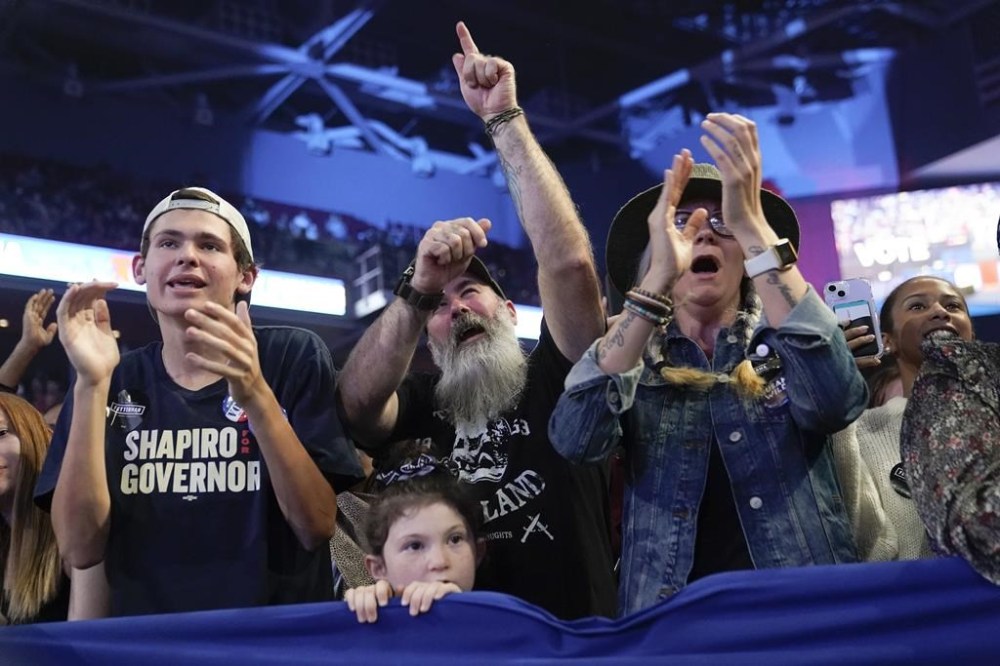 People cheer as President Joe Biden speaks at a campaign rally for Pennsylvania's Democratic gubernatorial candidate Josh Shapiro and Democratic Senate candidate Lt. Gov. John Fetterman, Saturday, Nov. 5, 2022, in Philadelphia. (AP Photo/Patrick Semansky)