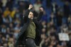 Manchester City's head coach Pep Guardiola celebrates at the end of the English Premier League soccer match between Manchester City and Fulham at Etihad stadium in Manchester, England, Saturday, Nov. 5, 2022. Manchester City won 2-1. (AP Photo/Dave Thompson)