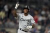 FILE - Chicago White Sox' Tim Anderson reacts towards the crowd while running the bases after hitting a three-run home run off New York Yankees relief pitcher Miguel Castro in the eighth inning of the second baseball game of a doubleheader, Sunday, May 22, 2022, in New York. The Chicago White Sox have picked up Tim Anderson's $12.5 million option for the 2023 season and declined their $5.5 million option on infielder Josh Harrison. The White Sox announced the moves on Monday, Nov. 7, 2022. (AP Photo/John Minchillo, File)