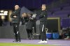 Canada's coach John Herdman, right, gives instructions to his players during the international friendly soccer match between Qatar and Canada, at the Viola Park stadium in Vienna, Austria, Friday, Sept. 23, 2022. (AP Photo/Florian Schroetter)