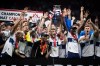 Vancouver Whitecaps' Russell Teibert, centre, hoists the Voyageurs Cup after Vancouver defeated Toronto FC in penalty kicks during the Canadian Championship soccer final, in Vancouver, on Tuesday, July 26, 2022. THE CANADIAN PRESS/Darryl Dyck