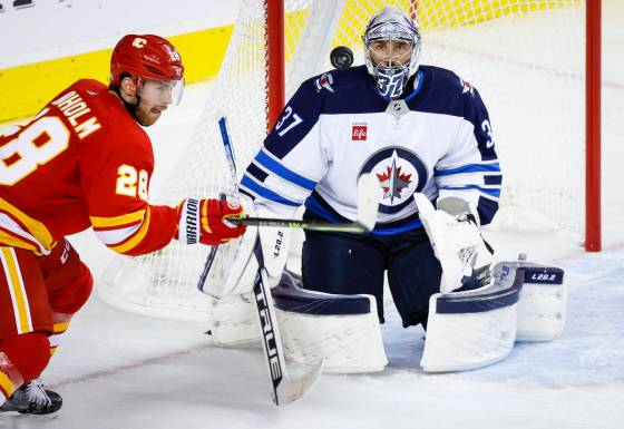 Jets goalie Connor Hellebuyck (Jeff McIntosh / The Canadian Press files)