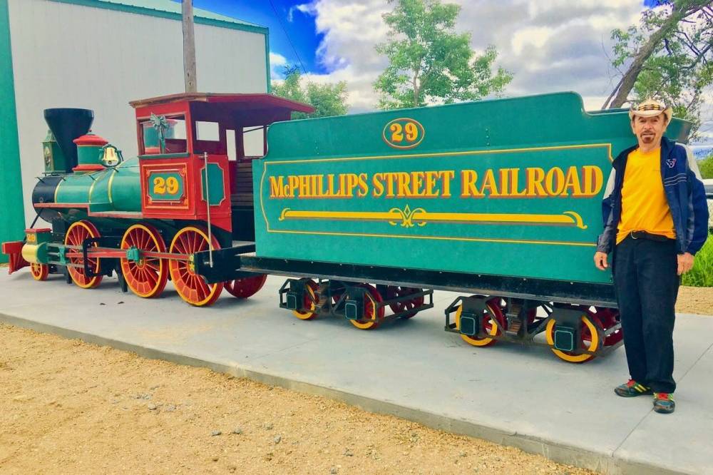 McPhillips Street Station’s former mini-train with Carrick Days’ organizer extraordinaire, Jim Danilchuk.