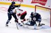 Winnipeg Jets’ Adam Lowry (left) has long been a leader on and off the ice. (Fred Greenslade / The Canadian Press files)