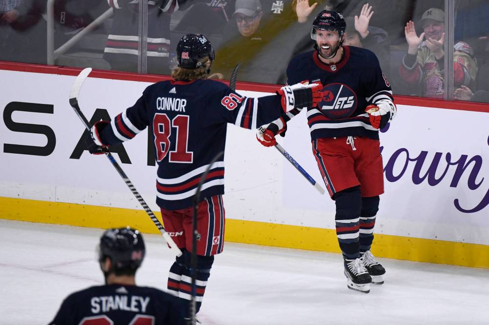Sam Gagner celebrates his third-period goal against the St. Louis Blues with teammate Kyle Connor on Monday. (Fred Greenslade / The Canadian Press)