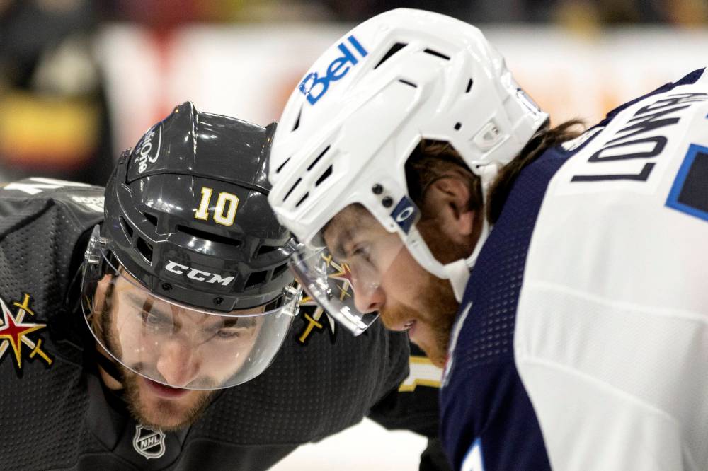 ELLEN SCHMIDT / THE ASSOCIATED PRESS
Vegas Golden Knights center Nicolas Roy faces off against Winnipeg Jets center Adam Lowry, right, during the second period.