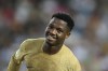 Barcelona's Ansu Fati reacts after a missed opportunity during a Spanish La Liga soccer match between Valencia and Barcelona at the Mestalla stadium in Valencia, Spain, Saturday, Oct. 29, 2022. (AP Photo/Alberto Saiz)