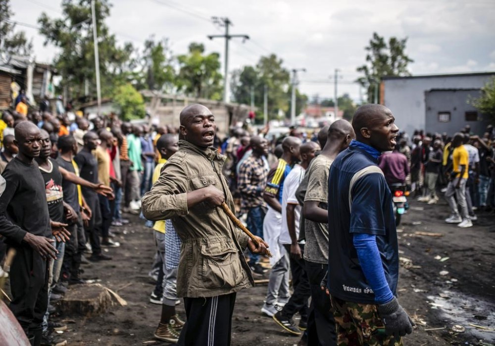 Democratic Republic of the Congo youth get the first steps of basic military training in Goma, eastern Congo, Monday, Nov. 7, 2022. More than 3,000 new Congolese military recruits began training Monday as the army steps up its fight against the M23 rebels in the country's east that the government alleges are backed by neighboring Rwanda. (AP Photo/Moses Sawasawa)