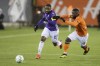 Pacific FC midfielder Jamar Dixon (22) battles for a ball with Forge FC defender Dominic Samuel (4) during Canadian Premier League championship game action at Tim Hortons Field in Hamilton, Ont., Sunday, Dec. 5, 2021. THE CANADIAN PRESS/Nick Iwanyshyn