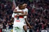 Stuttgart's Serhou Guirassy celebrates scoring with teammate Naouirou Ahamada, right, during the Bundesliga soccer match between VfB Stuttgart and Hertha BSC Berlin at Mercedes-Benz Arena, Stuttgart, Germany, Tuesday Nov. 8, 2022. (Tom Weller/dpa via AP)