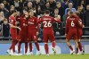 Liverpool's Mohamed Salah, second from left, celebrates with his teammates after scoring his side's second goal during the English Premier League soccer match between Tottenham Hotspur and Liverpool at Tottenham Hotspur Stadium, in London, Sunday, Nov. 6, 2022. (AP Photo/David Cliff)
