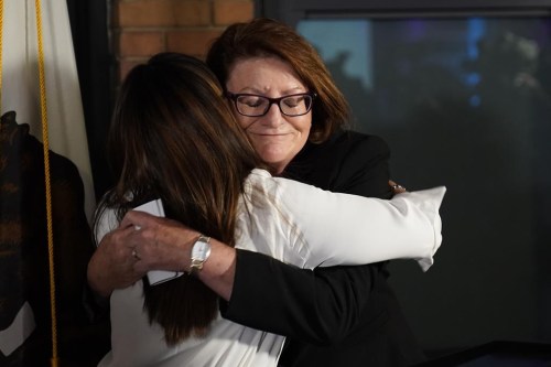 California state Senate President Pro Tempore Toni Atkins, right, hugs Jodie Hicks, chief executive officer and president of Planned Parenthood Affiliates of California, at a gathering in support of Proposition 1, in Sacramento, Calif., Tuesday, Nov. 8, 2022. Voters approved the measure that puts the right to an abortion in the California Constitution. (AP Photo/Rich Pedroncelli)