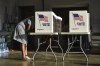 A voter casts their ballot in the 2022 midterm elections early Tuesday at Fire Station 26 in Jackson, Miss., Nov. 8, 2022. (Hannah Mattix/The Clarion-Ledger via AP)