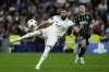 Real Madrid's Karim Benzema takes control of the ball during the Champions League Group F soccer match between Real Madrid and Celtic at the Santiago Bernabeu stadium in Madrid, Spain, Wednesday, Nov. 2, 2022. (AP Photo/Manu Fernandez)