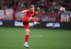 Canada's Alistair Johnston takes a shot on goal during the first half of a CONCACAF Nations League soccer match against Curacao in Vancouver on Thursday, June 9, 2022. THE CANADIAN PRESS/Darryl Dyck