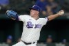 FILE - Texas Rangers relief pitcher Kolby Allard throws to a Kansas City Royals batter during the third inning of a baseball game May 11, 2022, in Arlington, Texas. The Atlanta Braves acquired Allard, a former first-round pick by the team, from the Rangers in exchange for right-hander Jake Odorizzi and cash, Wednesday, Nov. 9. (AP Photo/Tony Gutierrez, File)