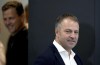 German national soccer coach Hansi Flick, right, and team manager Oliver Bierhoff, left, arrive for a press conference in Frankfurt, Germany, Thursday, Nov. 10, 2022 to present the German squad for the Qatar Soccer World Cup 2022. (AP Photo/Michael Sohn)