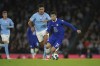 Chelsea's Christian Pulisic, right, challenges for the ball with Manchester City's Rodrigo during the English League Cup third round soccer match between Manchester City and Chelsea at Etihad Stadium in Manchester, England, Wednesday, Nov. 9, 2022. (AP Photo/Dave Thompson)