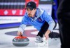 Team Quebec fourth Felix Asselin makes a shot while playing Team Wild Card Three at the Tim Hortons Brier in Lethbridge, Alta., Sunday, March 6, 2022. Felix Asselin's Quebec rink moved atop the championship pool standings with a 6-2 win over Northern Ontario on Thursday at the Canadian mixed curling championship. THE CANADIAN PRESS/Jeff McIntosh