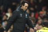 Aston Villa's head coach Unai Emery walks off the pitch at half-time during the English League Cup third round soccer match between Manchester United and Aston Villa in Manchester, England, Thursday, Nov. 10, 2022. (AP Photo/Dave Thompson)