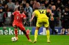 Munich's Sadio Mane, left, and Milan's Raoul Bellanova in action during the Champions League Group C soccer match between Bayern Munich and Inter Milan at Allianz Arena stadium in Munich, Germany, Tuesday, Nov. 1, 2022. (Sven Hoppe/dpa via AP)