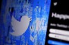 FILE - The Twitter splash page is seen on a digital device, Monday, April 25, 2022, in San Diego. Twitter is once again adding gray “official” labels to some prominent accounts, Thursday, Nov. 10. The company, in its second chaotic week after billionaire Elon Musk took over, had rolled out the labels earlier this week, only to kill them a few hours later. (AP Photo/Gregory Bull)