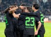 Monchengladbach's Jonas Hofmann, center, celebrates scoring during the Bundesliga soccer match between Borussia Monchengladbach and Borussia Dortmund at Borussia-Park, Monchengladbach, Germany, Friday Nov. 11, 2022. (Bernd Thissen/dpa via AP)
