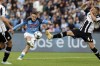 Napoli's Piotr Zielinski, center, scores his side's second goal during the Serie A soccer match between Napoli and Udinese, at the Diego Armando Maradona stadium in Naples, Italy, Saturday, Nov. 12, 2022. (Alessandro Garofalo/LaPresse via AP)