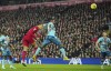 Liverpool's Virgil van Dijk, second left, heads the ball during the English Premier League soccer match between Liverpool and Southampton at Anfield stadium in Liverpool, England, Saturday, Nov. 12, 2022. (AP Photo/Jon Super)