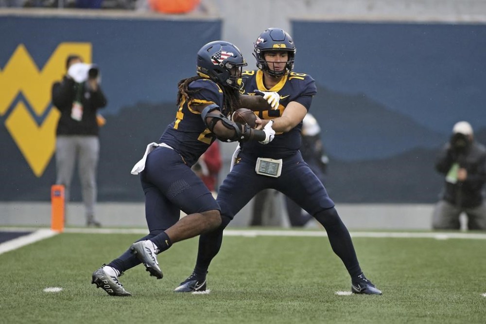 Greene shines in relief, Legg’s FG lifts WVU over Oklahoma Winnipeg