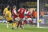 Arsenal's Martin Odegaard, second left, scores their side's first goal of the game during the English Premier League soccer match between Wolverhampton Wanderers and Arsenal, at Molineux, Wolverhampton, England, Saturday Nov. 12, 2022. (Nigel French/PA via AP)