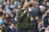 Manchester City's head coach Pep Guardiola gestures at the end of the English Premier League soccer match between Manchester City and Brentford, at the Etihad stadium in Manchester, England, Saturday, Nov.12, 2022. Brentford won 2-1.(AP Photo/Dave Thompson)