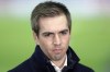 FILE - Former german national player Philipp Lahm looks on during the international friendly soccer match between Germany and Brazil in Berlin, Germany, Tuesday, March 27, 2018. On Sunday, Nov, 13, 2022, seven days before the World Cup is due to start in Qatar, former Germany captain Philipp Lahm says it was “a mistake” to award the tournament to the Gulf Arab country. (AP Photo/Michael Sohn, File)