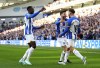 Brighton's Alexis Mac Allister, right, celebrates scoring their side's first goal of the game during the English Premier League soccer match between Brighton and Hove Albion and Aston Villa at the American Express Community Stadium, Brighton, England, Sunday, Nov. 13, 2022. (John Walton/PA via AP)