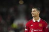 Manchester United's Cristiano Ronaldo smiles before the start of the Europa League group E soccer match between Manchester United and Sheriff at Old Trafford in Manchester, England, Thursday Oct. 27, 2022. (AP Photo/Jon Super)