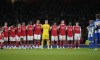 Arsenal players observe a minutes silence for Armistice Day ahead the English League Cup third round soccer match between Arsenal and Brighton and Hove Albion at the Emirates stadium in London, Wednesday, Nov. 9, 2022. (AP Photo/Kirsty Wigglesworth)