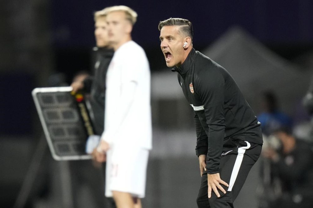 Canada coach John Herdman gives instructions to his players during the international friendly soccer match between Qatar and Canada, at the Viola Park stadium in Vienna, Austria, Friday, Sept. 23, 2022. Herdman believed when virtually no one else did. Canada was going to the World Cup in 2022. That was his message at his first camp in charge, in March 2018 in Murcia, Spain. THE CANADIAN PRESS/AP-Florian Schroetter