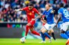 Leipzig's Christopher Nkunku, left, in action against Hoffenheim's Kevin Vogt during a German Bundesliga soccer match between TSG 1899 Hoffenheim and RB Leipzig in Sinsheim, Germany, Saturday, Nov.5, 2022. (Tom Weller/dpa via AP)