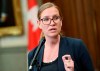 Minister of Families, Children and Social Development Karina Gould speaks to reporters before heading to Question Period in the House of Commons on Parliament Hill in Ottawa on Thursday, June 23, 2022. THE CANADIAN PRESS/Justin Tang