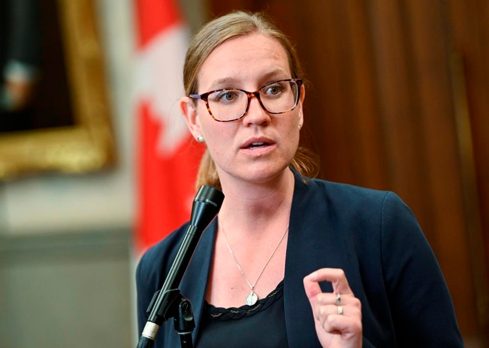 Minister of Families, Children and Social Development Karina Gould speaks to reporters before heading to Question Period in the House of Commons on Parliament Hill in Ottawa on Thursday, June 23, 2022. THE CANADIAN PRESS/Justin Tang
