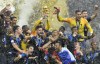 FILE - France goalkeeper Hugo Lloris lifts the trophy after France won 4-2 during the final match between France and Croatia at the 2018 soccer World Cup in the Luzhniki Stadium in Moscow, Russia, Sunday, July 15, 2018. (AP Photo/Martin Meissner)