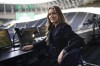 Commentator Pien Meulensteen poses for a photo ahead of the English Premier League soccer match between Tottenham Hotspur and Leeds United at the Tottenham Hotspur Stadium in London, Saturday, Nov. 12, 2022. The World Cup will sound different this year.
 Jacqui Oatley will become the first woman play-by-play commentator for U.S. World Cup telecasts, heading one of Fox's five broadcast teams for the tournament in Qatar that opens Sunday. Pien Meulensteen, Vicki Sparks and Robyn Cowen are among the broadcasters for matches on BBC in Britain. (AP Photo/David Cliff)