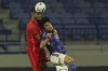 Canada's Steven Vitoria, left, and Japan's Ayase Ueda jump for the ball during a friendly soccer match between Canada and Japan in Dubai, Thursday, Nov. 17, 2022. THE CANADIAN PRESS/AP/Christopher Pike