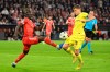 Munich's Sadio Mane, left, and Milan's Nicolo Barella fight for the ball during the Champions League Group C soccer match between Bayern Munich and Inter Milan at Allianz Arena stadium in Munich, Germany, Tuesday, Nov. 1, 2022. (Sven Hoppe/dpa via AP)