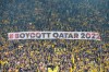 FILE -- Fans display a banner during the German Bundesliga soccer match between Borussia Dortmund and VfB Stuttgart in Dortmund, Germany, Saturday, Oct. 22, 2022. Normally when the World Cup comes around, Germans proudly fly their country’s flag and enthusiastically back their team. Not this time. People boycotting the tournament and many fans say they won't watch in protest against human rights abuses in Qatar.  (AP Photo/Martin Meissner,file)