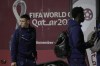 Phil Foden, left, and Bukayo Saka of England' s national soccer team arrive with teammates at Hamad International Airport in Doha, Qatar, Tuesday, Nov. 15, 2022, ahead of the upcoming World Cup. England will play their first match in the World Cup against Iran on Nov. 21. (AP Photo/Hassan Ammar)