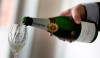 Champagne is served at the Pol Roger Champagne House in Epernay, France, on Oct. 15, 2014. Champagne, whiskey, vodka and even some sommelier-selected wines will be available for some fans at World Cup stadiums in Qatar. And beer also. But the privilege of drinking alcohol will come at a price for this exclusive group of high rollers. Fans will be able to enjoy alcoholic drinks and fine food in the luxurious hospitality lounges at the eight stadiums for $3,000 per ticket. (AP Photo/Virginia Mayo, File)