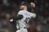 FILE - Colorado Rockies' Tyler Kinley pitches during a baseball game against the San Francisco Giants in San Francisco, June 8, 2022. Kinley and the Rockies agreed Friday, Nov. 18, 2022, to a $6.25 million, three-year contract, a deal that could increase to $9.25 million if he becomes the team’s closer when he returns from elbow surgery. (AP Photo/Jeff Chiu, File)